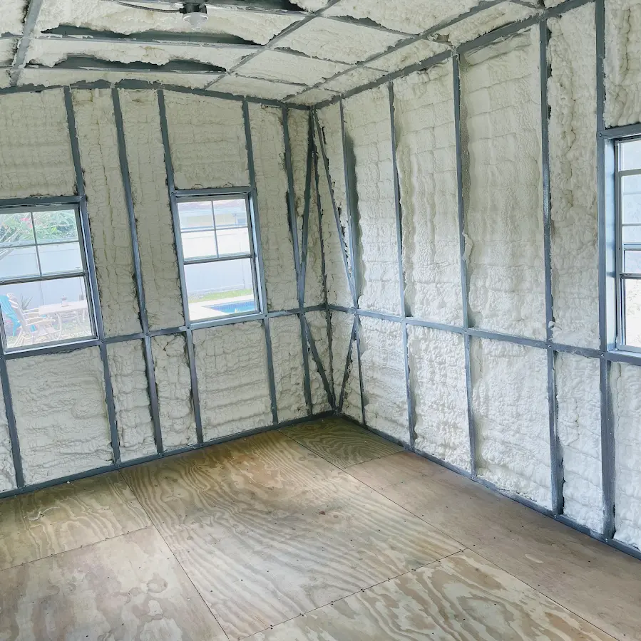 Closed-cell spray foam insulation applied to wall cavities in a residential project in Zimmerman